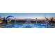 Community splash pad with water features and a view of the Las Vegas strip at 242 Homeward Way, Henderson, NV 89011