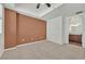Cozy bedroom featuring neutral tones, plush carpeting, and an ensuite bathroom at 2455 W Serene Ave # 851, Las Vegas, NV 89123