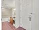 Hallway view leading to bathroom with washer/dryer combo and tiled flooring at 2455 W Serene Ave # 851, Las Vegas, NV 89123