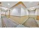 Elegant building hallway featuring decorative carpets and neutral wall colors at 2455 W Serene Ave # 851, Las Vegas, NV 89123