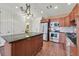 Open concept kitchen with stainless steel appliances and breakfast bar at 2455 W Serene Ave # 851, Las Vegas, NV 89123