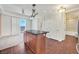 Open layout kitchen with stainless island and access to the patio at 2455 W Serene Ave # 851, Las Vegas, NV 89123