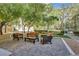 Serene outdoor patio with comfortable seating amidst lush greenery at 2455 W Serene Ave # 851, Las Vegas, NV 89123