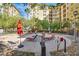 Relaxing pool area with lounge chairs and umbrellas with the building in the background at 2455 W Serene Ave # 851, Las Vegas, NV 89123