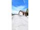 Spacious home exterior featuring a long driveway, desert landscaping, and mountain views at 2780 Avenue Of The Stars, Pahrump, NV 89060