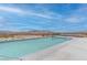 Enjoy serene views from this pool overlooking the desert landscape and distant mountains at 2780 Avenue Of The Stars, Pahrump, NV 89060
