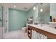 Modern bathroom featuring vanity with storage, large mirror, and a glass-enclosed shower at 29 Montelago Blvd # 209, Henderson, NV 89011