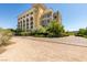 Exterior of building featuring trees and landscaped walkways at 29 Montelago Blvd # 209, Henderson, NV 89011