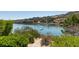 Beautiful lake view featuring several buildings, boats, and distant mountains at 29 Montelago Blvd # 209, Henderson, NV 89011