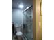 Modern bathroom featuring a glass-enclosed shower with tiled walls at 3550 Bay Sands Dr # 2053, Laughlin, NV 89029
