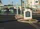 Community entrance gate with palm tree design for residents and visitors with signage at 3550 Bay Sands Dr # 2053, Laughlin, NV 89029