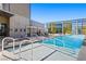 Stunning pool area featuring modern lounge furniture and a pristine pool at 3722 Las Vegas Blvd # 603, Las Vegas, NV 89158