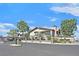 Exterior view of Flamingo Heights community gate and manicured landscaping at 3935 Tirana Way, Las Vegas, NV 89103