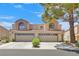 Charming two-story home with well-manicured landscaping and a spacious two-car garage at 3935 Tirana Way, Las Vegas, NV 89103
