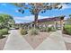 Community featuring lush landscaping and well-maintained walkways throughout at 3935 Tirana Way, Las Vegas, NV 89103