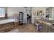 Full main bathroom featuring a soaking tub, tiled vanity, and large mirrors at 4011 Scott Russell Ct, North Las Vegas, NV 89031