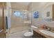 Bathroom featuring a shower with glass doors and modern sink at 4011 Scott Russell Ct, North Las Vegas, NV 89031