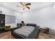 A contemporary bedroom featuring sleek furnishings and modern lighting, perfect for relaxation at 4011 Scott Russell Ct, North Las Vegas, NV 89031