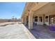 The covered patio has a stamped concrete floor and decorative pillar accents at 4011 Scott Russell Ct, North Las Vegas, NV 89031