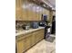 Kitchen features granite countertops, tile floors, and stainless steel appliances at 4011 Scott Russell Ct, North Las Vegas, NV 89031