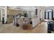Kitchen featuring stone accents, modern appliances, and a breakfast bar with seating at 4011 Scott Russell Ct, North Las Vegas, NV 89031