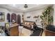 Versatile living space featuring decorative shutters, a comfortable sitting area, and workout equipment at 4011 Scott Russell Ct, North Las Vegas, NV 89031