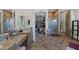Spacious main bathroom showcasing a walk-in closet, walk in shower, and dual sink vanity at 4011 Scott Russell Ct, North Las Vegas, NV 89031