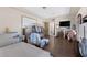 Main bedroom featuring hardwood floors, walk in closet, and access to the ensuite bathroom at 4011 Scott Russell Ct, North Las Vegas, NV 89031