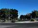 Serene community park with mature trees and well-maintained green spaces, ideal for outdoor recreation at 4011 Scott Russell Ct, North Las Vegas, NV 89031