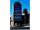 Sign for commercial center with Walmart, Planet Fitness, and other stores with easy street access at 4011 Scott Russell Ct, North Las Vegas, NV 89031