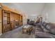 A large living room is anchored by a beautiful built-in entertainment center at 420 Aloha Dr, Henderson, NV 89015