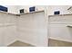 A walk-in closet with carpeted floors and plenty of shelves at 4350 E Brusca Way, Pahrump, NV 89061
