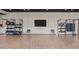 Spacious gym featuring a TV, various exercise equipment, and padded walls for soundproofing at 4350 E Brusca Way, Pahrump, NV 89061
