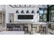 Kitchenette includes stainless steel sink, bar seating and lots of natural light from the nearby window at 4350 E Brusca Way, Pahrump, NV 89061