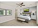 Comfortable bedroom includes a walk-in shower, plush carpet, and calm, cool tones at 4450 E Brusca Ct, Pahrump, NV 89061