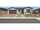 Charming single-story home with a well-maintained front yard and a two-car garage at 4450 E Brusca Ct, Pahrump, NV 89061