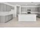 Well-lit kitchen featuring gray cabinetry, stainless appliances, and a center island at 4450 E Brusca Ct, Pahrump, NV 89061