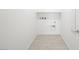 A compact laundry room with hookups, providing functionality and convenience at 4450 E Brusca Ct, Pahrump, NV 89061