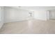 Bright, open-concept living area with hard surface flooring and recessed lighting at 4450 E Brusca Ct, Pahrump, NV 89061
