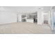 Open-concept living area flowing into the kitchen with ample natural light at 4450 E Brusca Ct, Pahrump, NV 89061