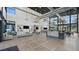 Open lobby area featuring a reception desk, lounge seating, and modern decor at 4450 E Brusca Ct, Pahrump, NV 89061