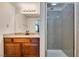 Updated bathroom featuring a vanity with granite counters and a tiled shower at 5240 Indian River Dr # 273, Las Vegas, NV 89103