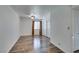 Bright bedroom featuring wood-look floors, a ceiling fan, and double-door closet for ample storage at 5240 Indian River Dr # 273, Las Vegas, NV 89103
