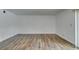 Unfurnished living room boasting wood floors, natural light, and neutral walls at 5240 Indian River Dr # 273, Las Vegas, NV 89103