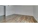 Unfurnished living room boasting wood floors, natural light, and neutral walls at 5240 Indian River Dr # 273, Las Vegas, NV 89103