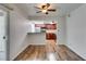 Charming living room featuring wood flooring, a kitchen bar, and a welcoming atmosphere at 5240 Indian River Dr # 273, Las Vegas, NV 89103