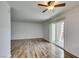 Inviting living room with wood flooring, and large sliding glass doors that offers great light at 5240 Indian River Dr # 273, Las Vegas, NV 89103