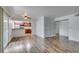 Inviting living room showcasing updated wood flooring and an open view into the kitchen area at 5240 Indian River Dr # 273, Las Vegas, NV 89103