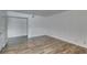 Spacious living room with wood floors and ample natural light from windows at 5240 Indian River Dr # 273, Las Vegas, NV 89103