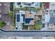 An aerial view of a home with solar panels, landscaped yard, and neighborhood surroundings at 605 N 4Th St, Las Vegas, NV 89101